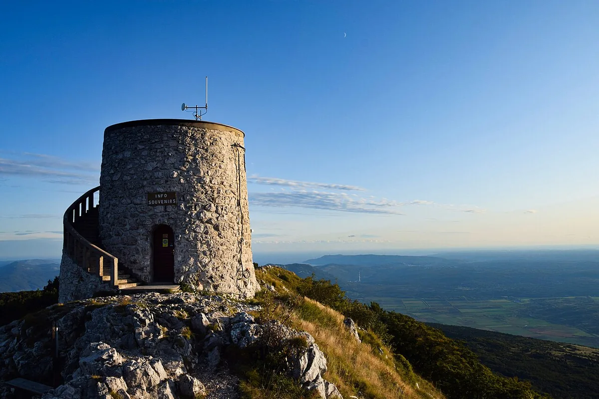 Beneath the long line of Učka.